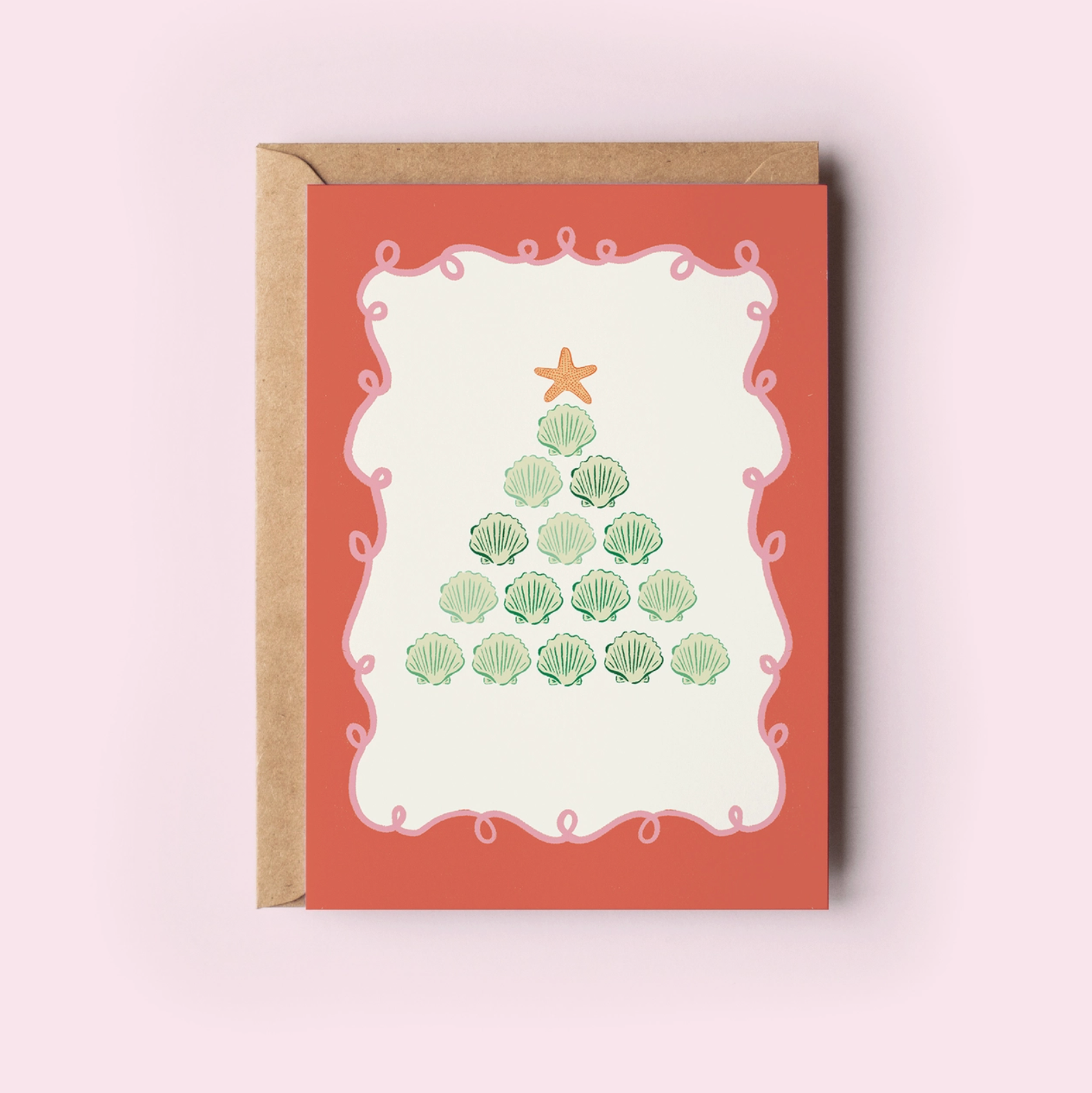 Seashells in Christmas tree shape holiday greeting card on light pink background