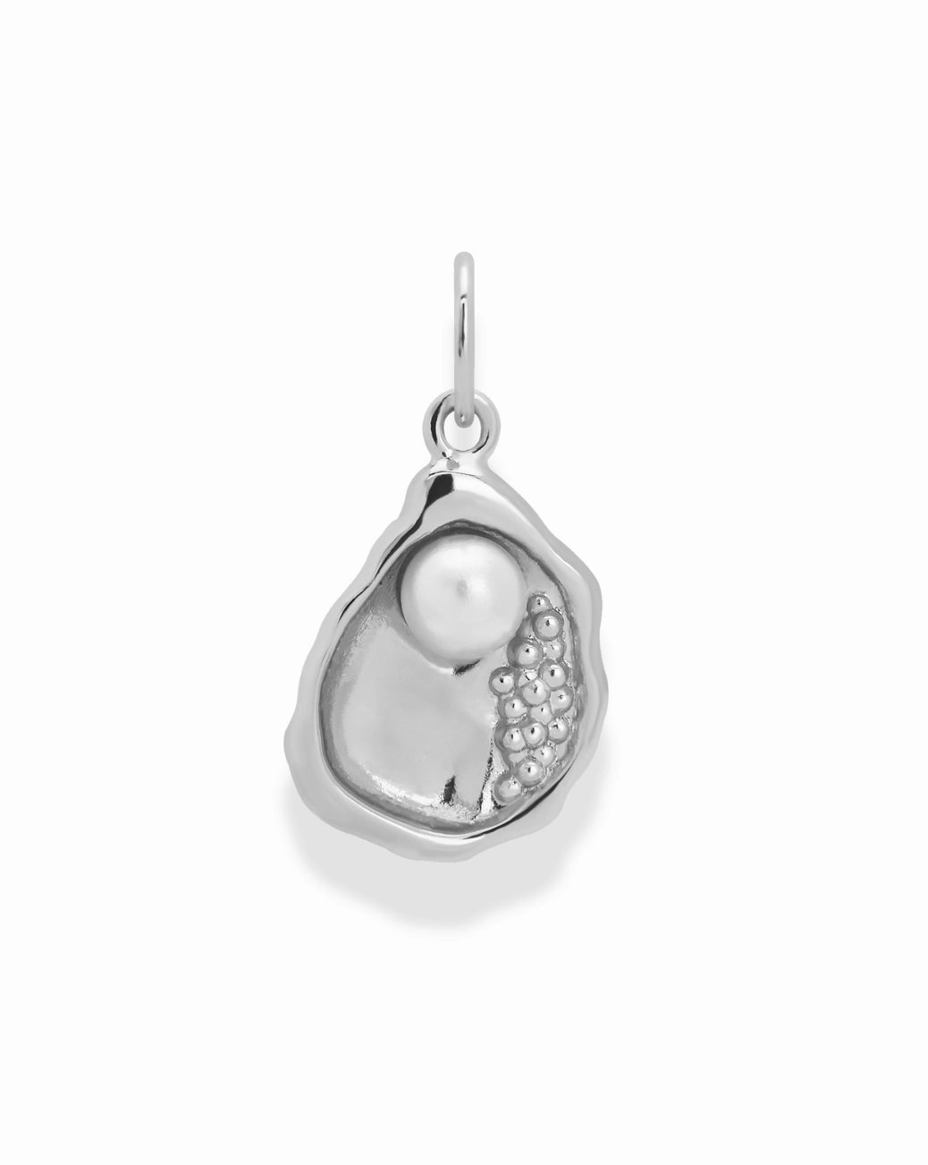 a silver charm of an oyster with an inlay pearl on a white background