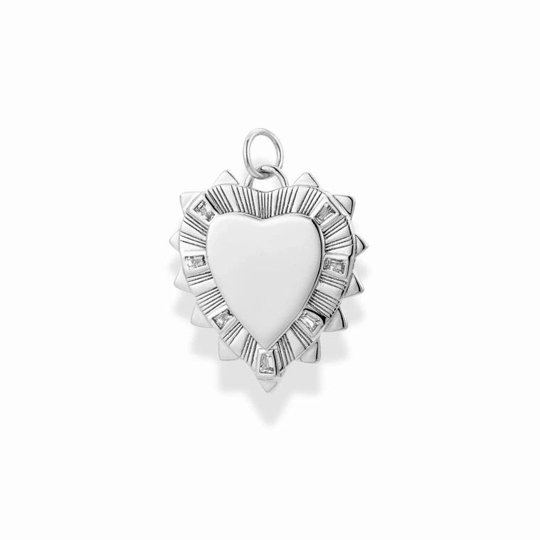 Silver heart-shaped pendant with a white background