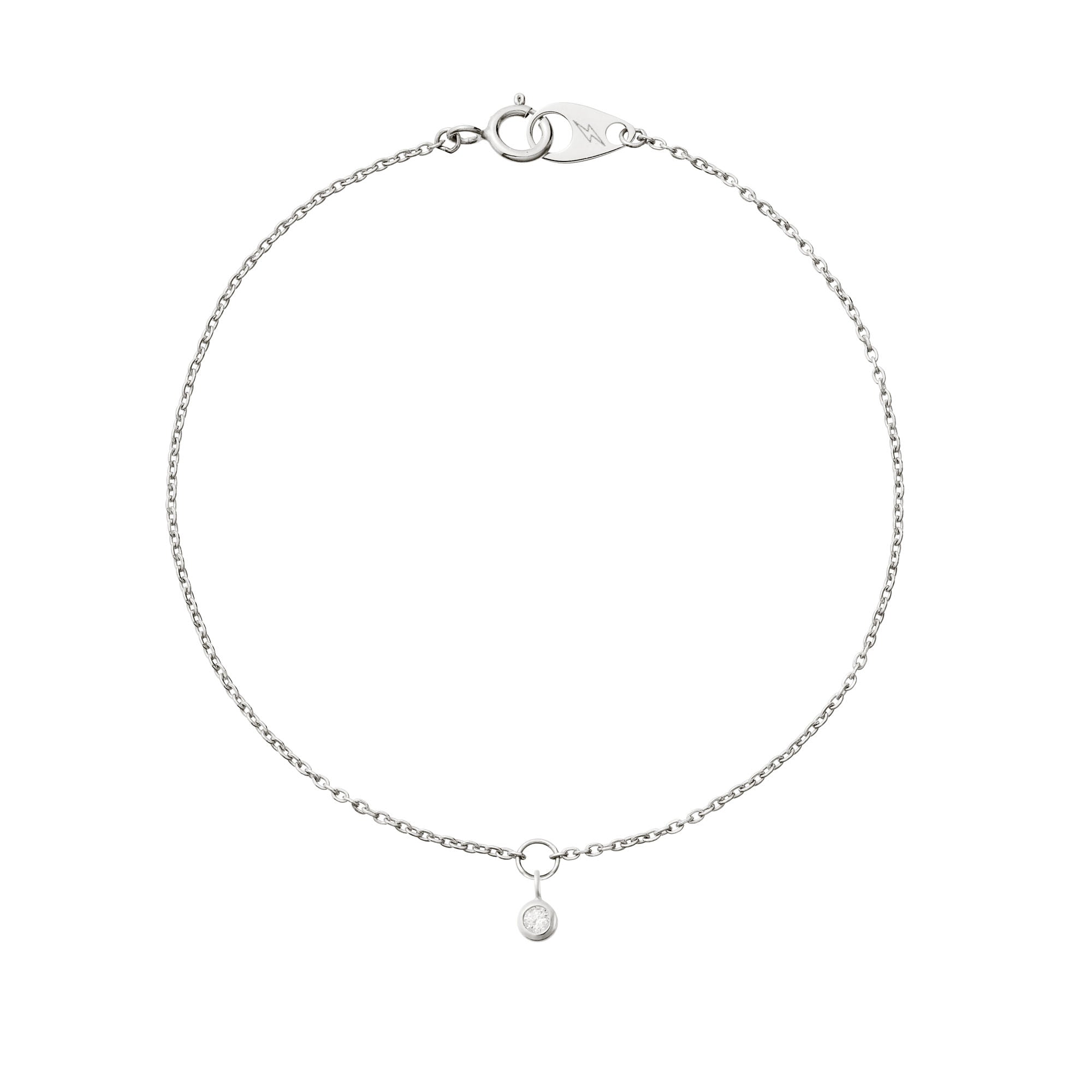A delicate hanging 14k white gold birthstone on a 14k white gold mini cable bracelet on a white background