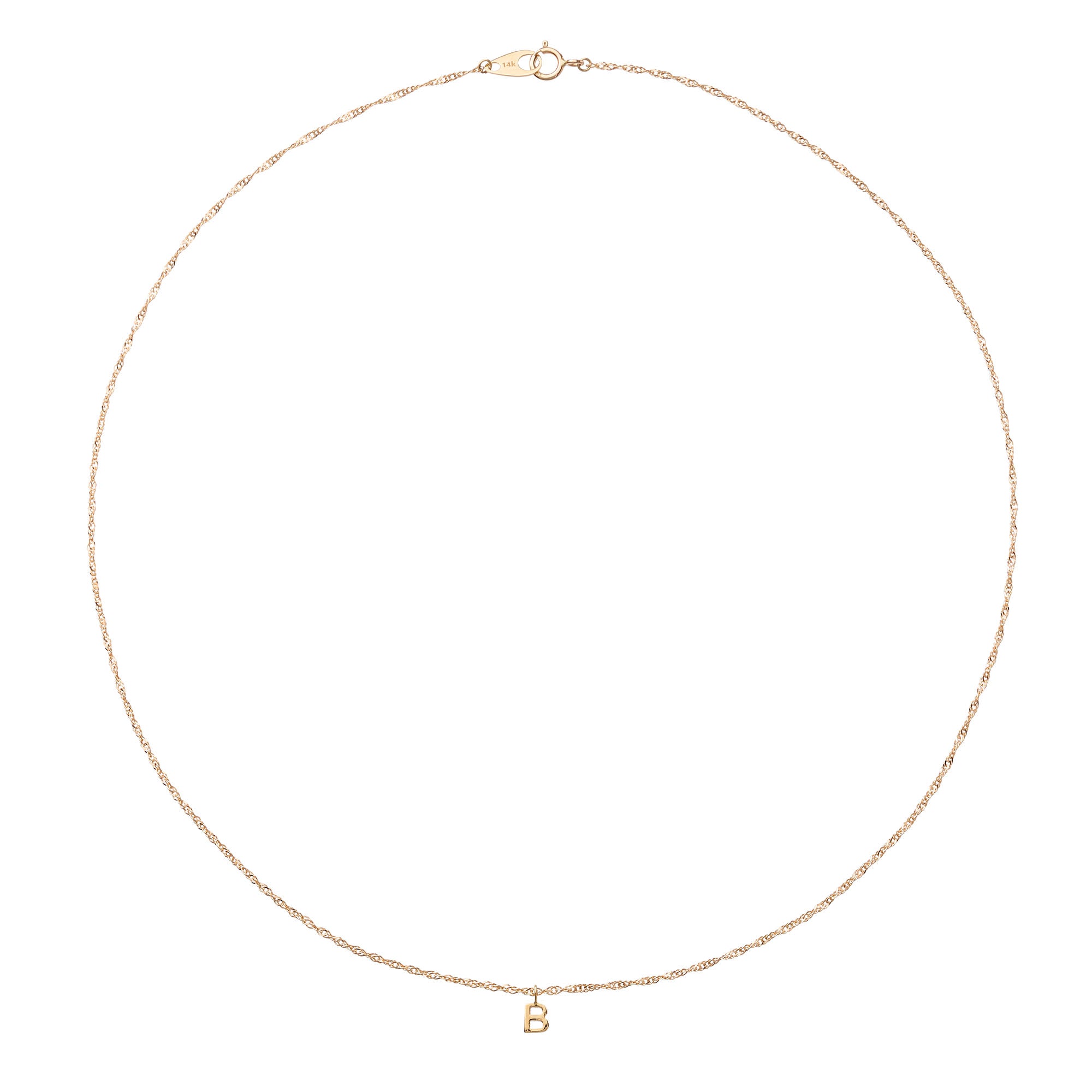 Gold necklace with a small pendant on a white background