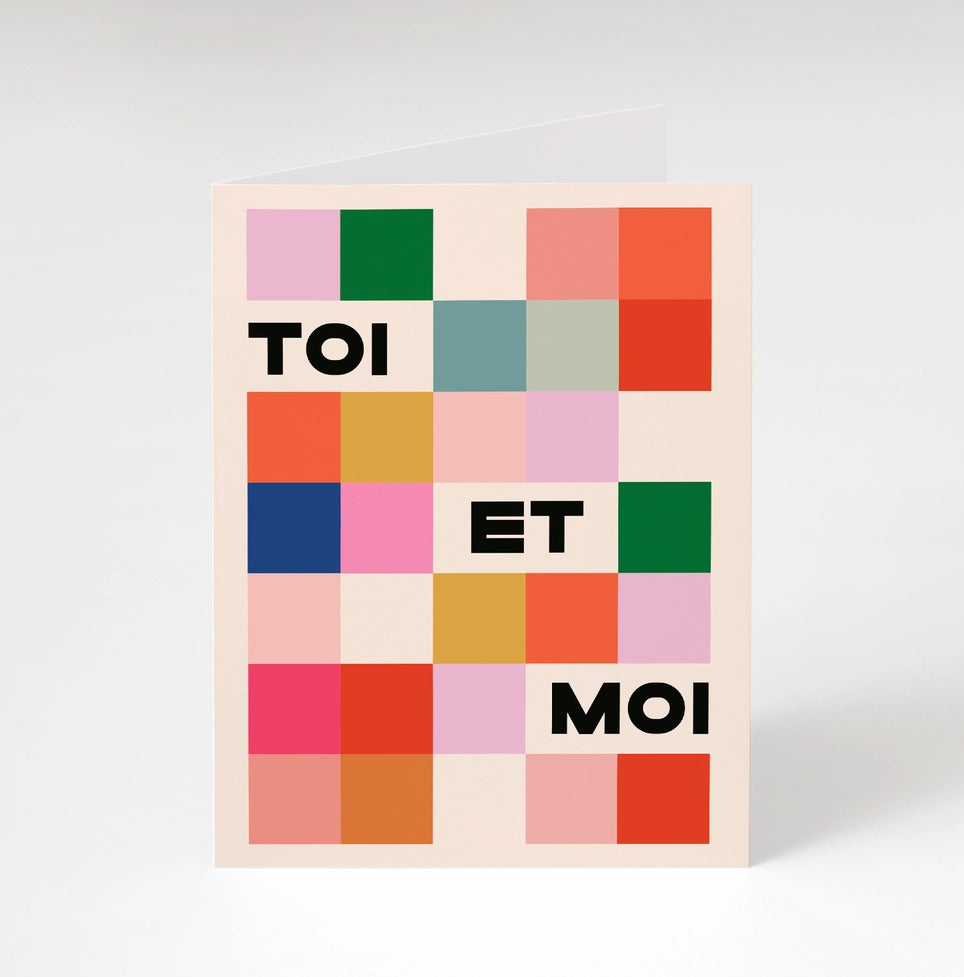 Colorful checkered design with 'TOI ET MOI' text on a light gray background