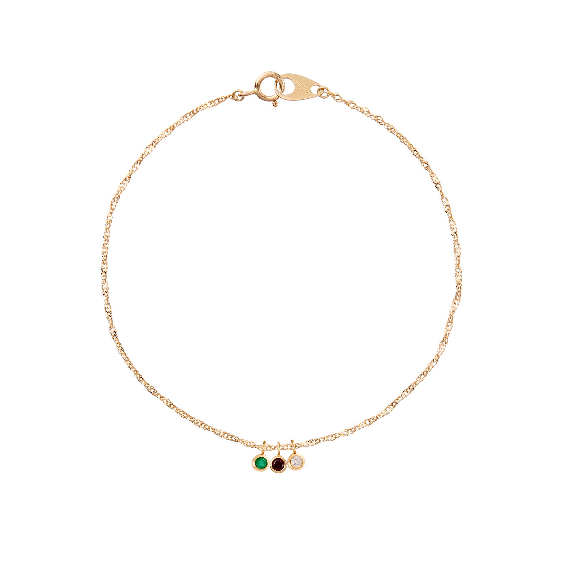 Gold bracelet with three charms on a white background