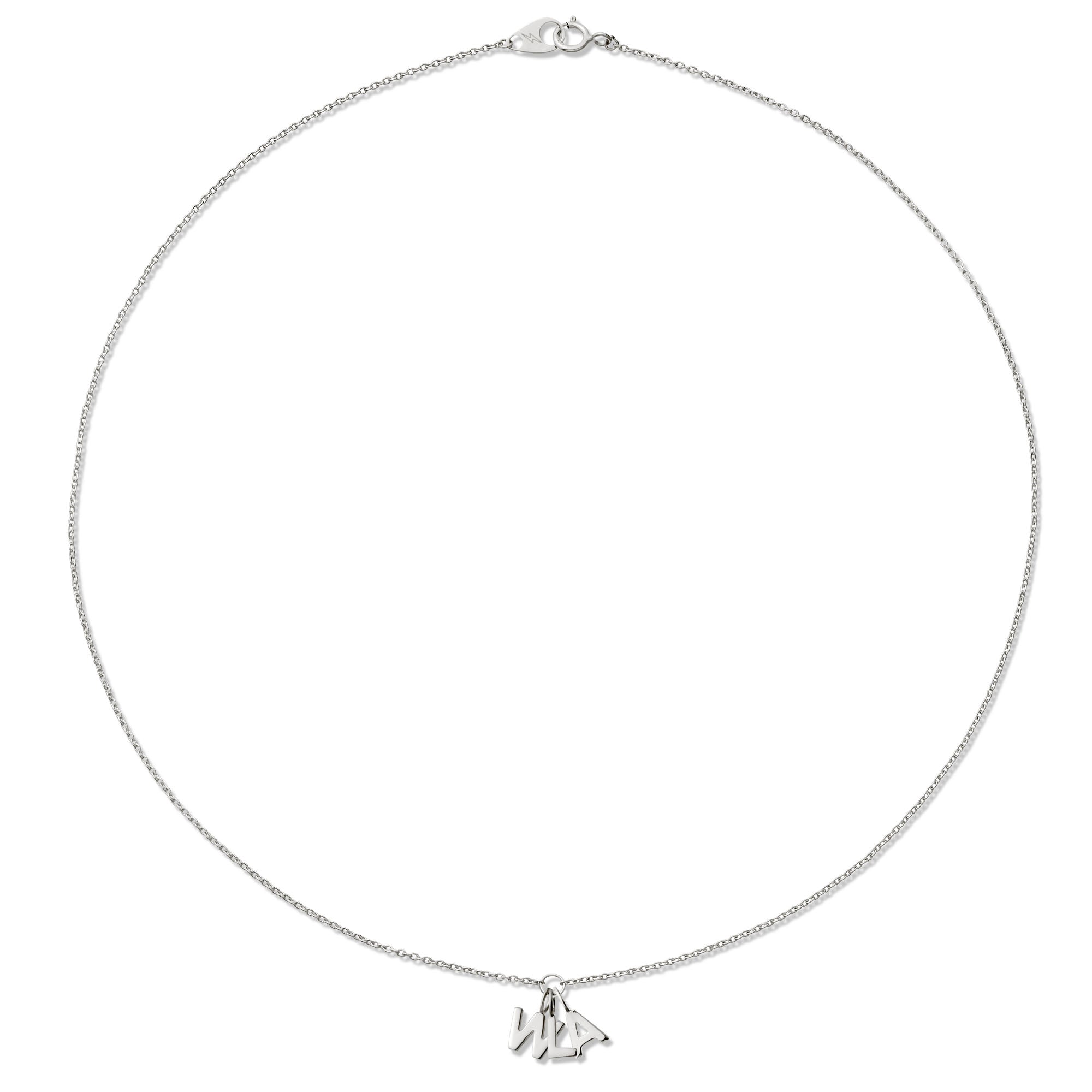 White gold necklace with three initial pendants on white background