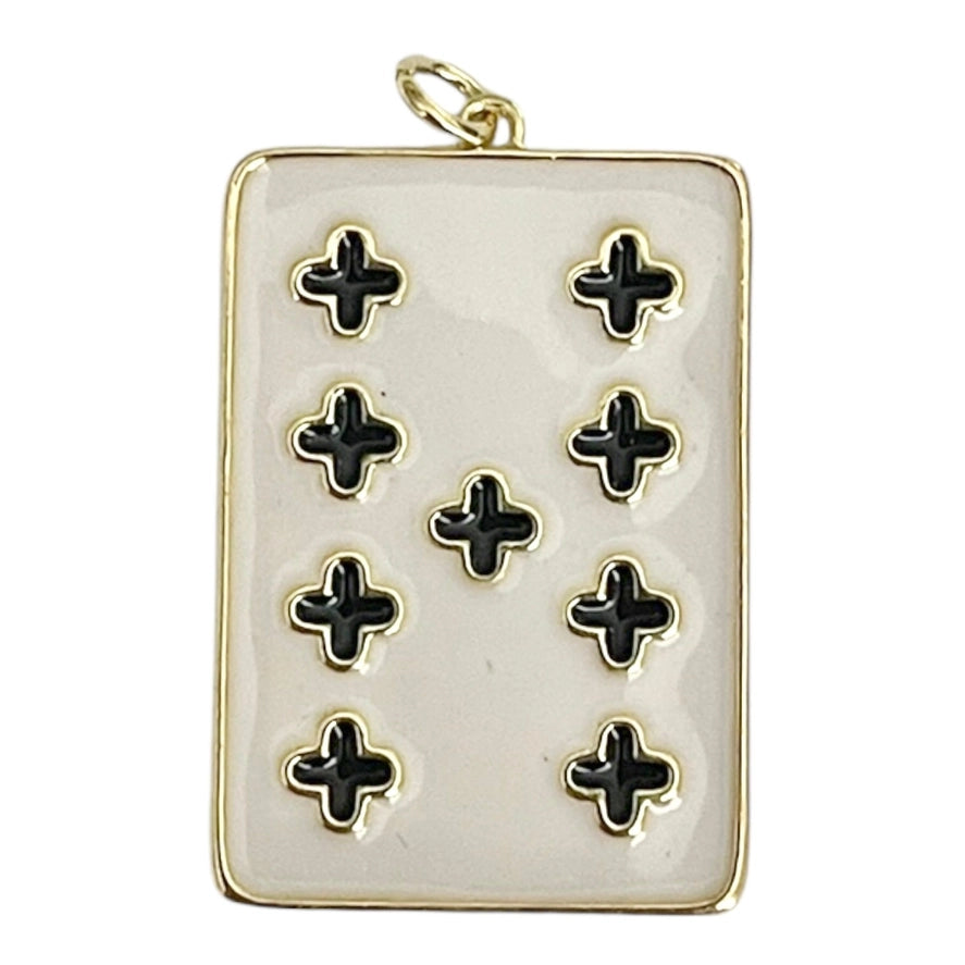 gold plated playing card charm with white and black enamel accents on a white background