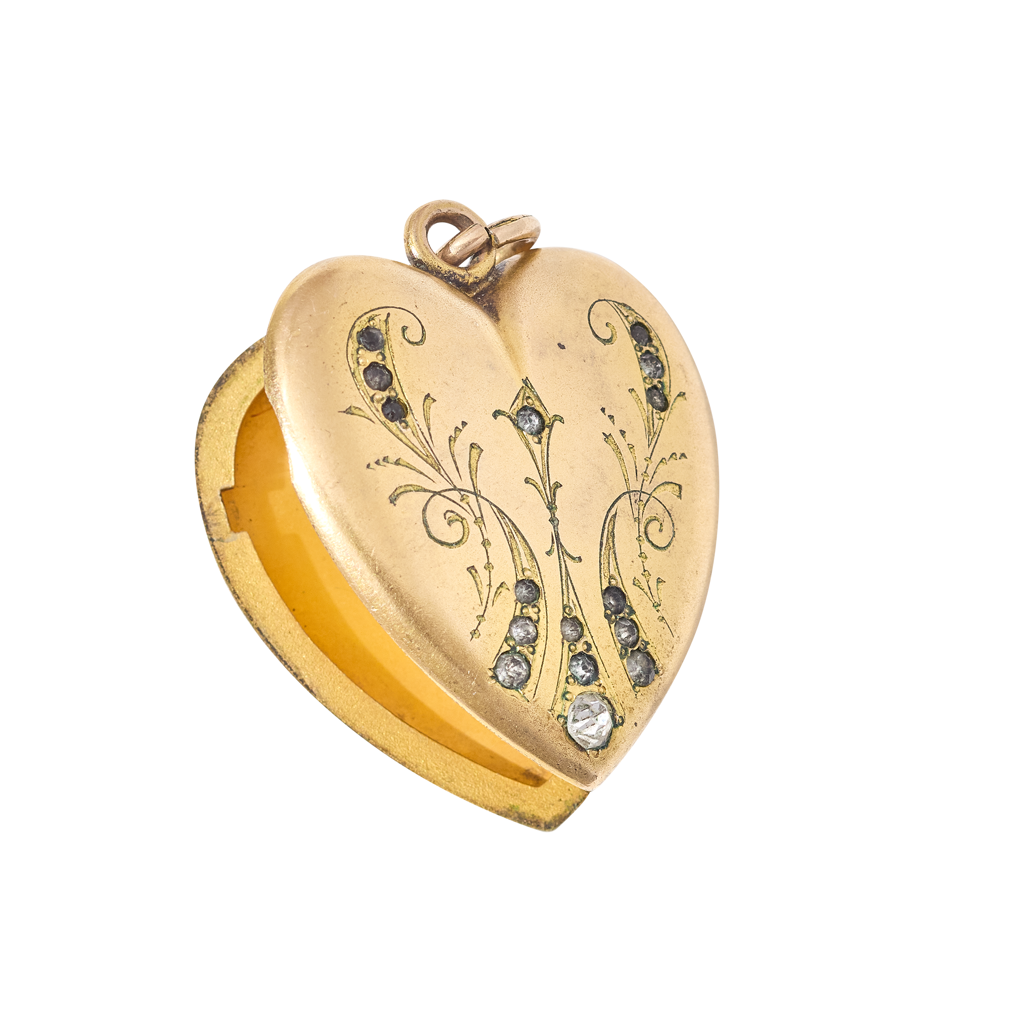 Gold heart-shaped locket with engraved designs on a white background