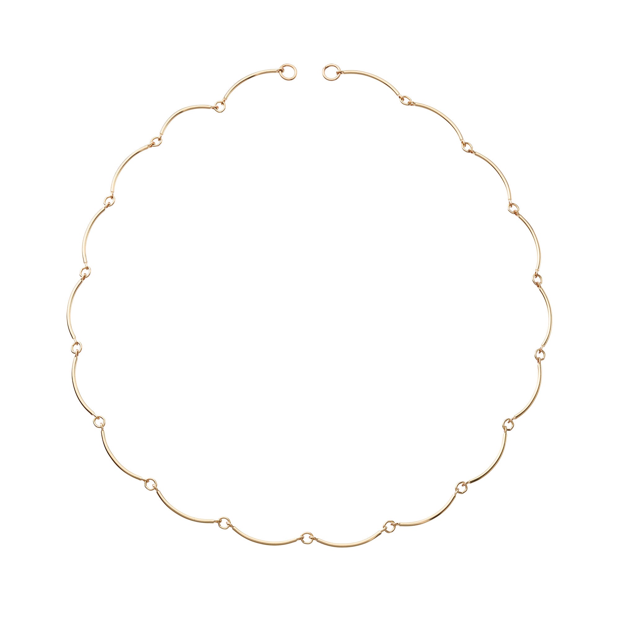 Gold wavy necklace on a white background