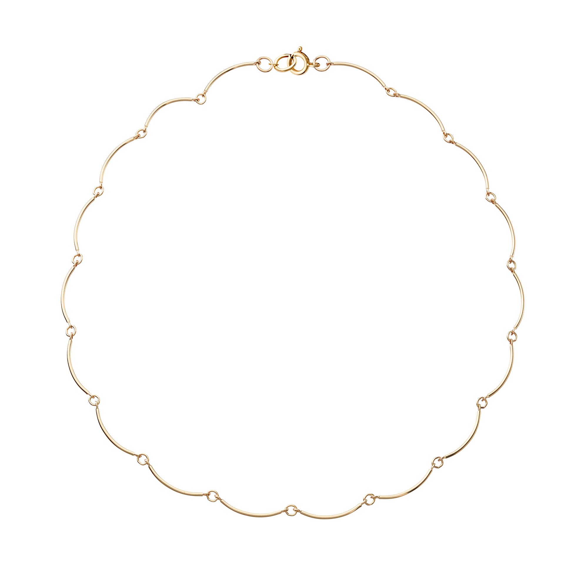 Gold wavy necklace on a white background with a clasp