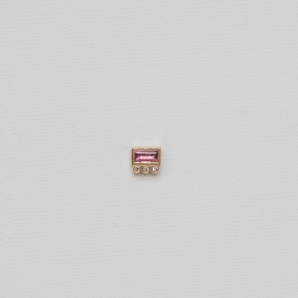 14k yellow gold pink tourmaline baguette diamond stud on white background