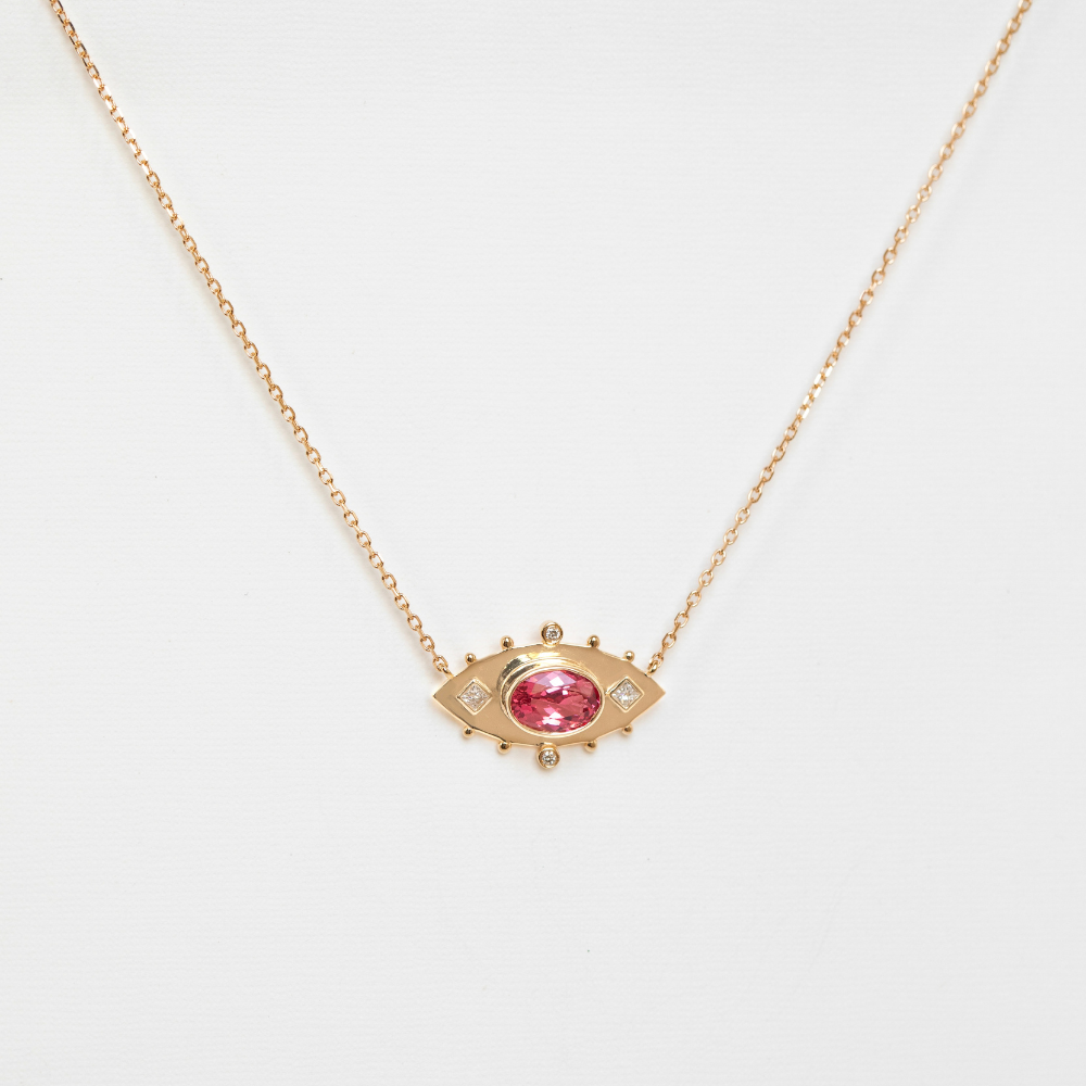 14K yellow gold Spinel Necklace, featuring a pink spinel, white diamonds, and a delicate 40cm chain on a grey background.