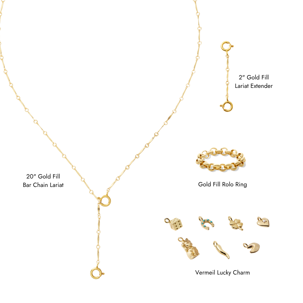 This bundle includes our signature Gold Fill Bar Chain Lariat (20") for that sleek, elongating silhouette, paired with a 2" Gold Fill Lariat Extender so you can customize your look with ease. We’ve added one of our coveted Lucky Charms in Vermeil for a personal, meaningful touch, plus a classic Gold Fill Rolo Ring to complete your stack.