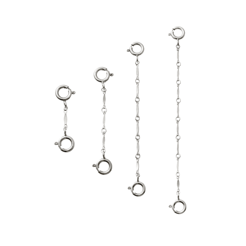 Set of silver chain links on a white background