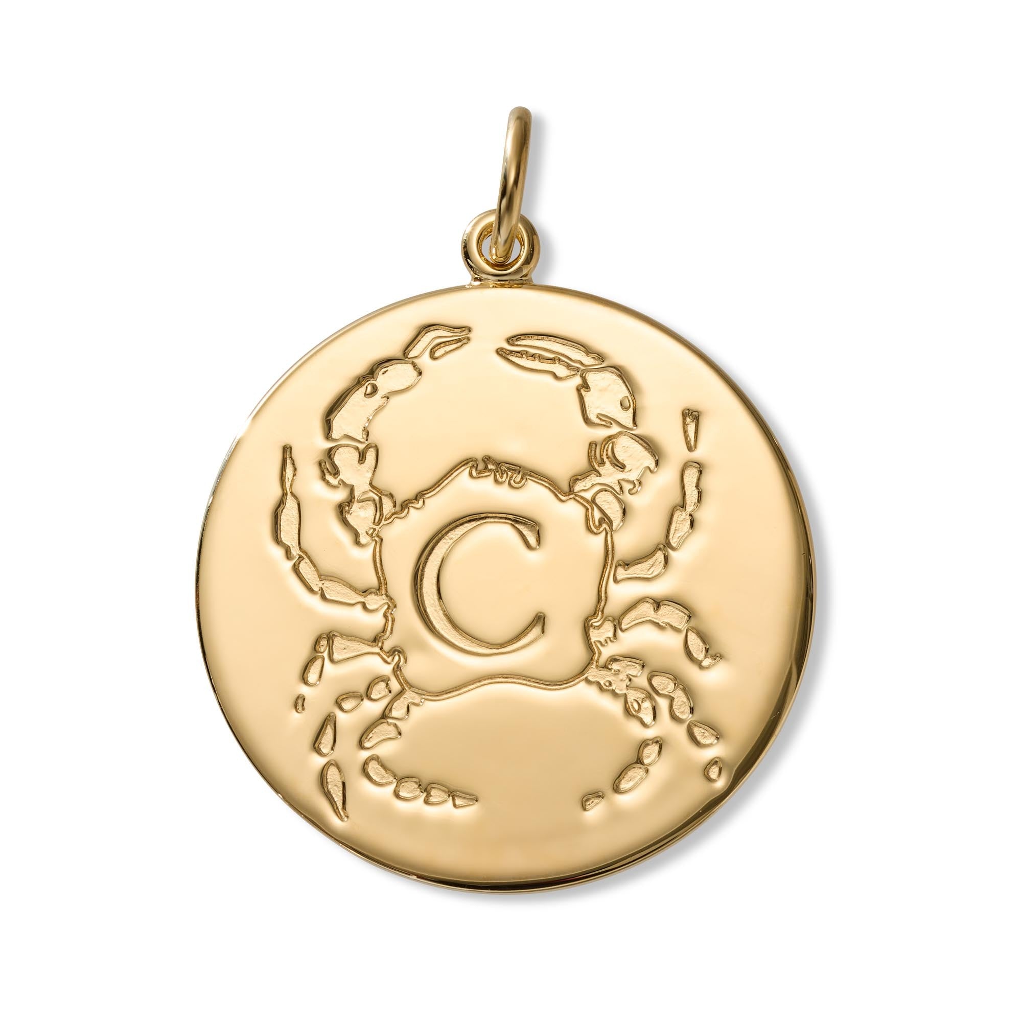 A round gold pendant charm featuring an engraved crab design with a capital letter 'C' in the center, set against a plain white background.