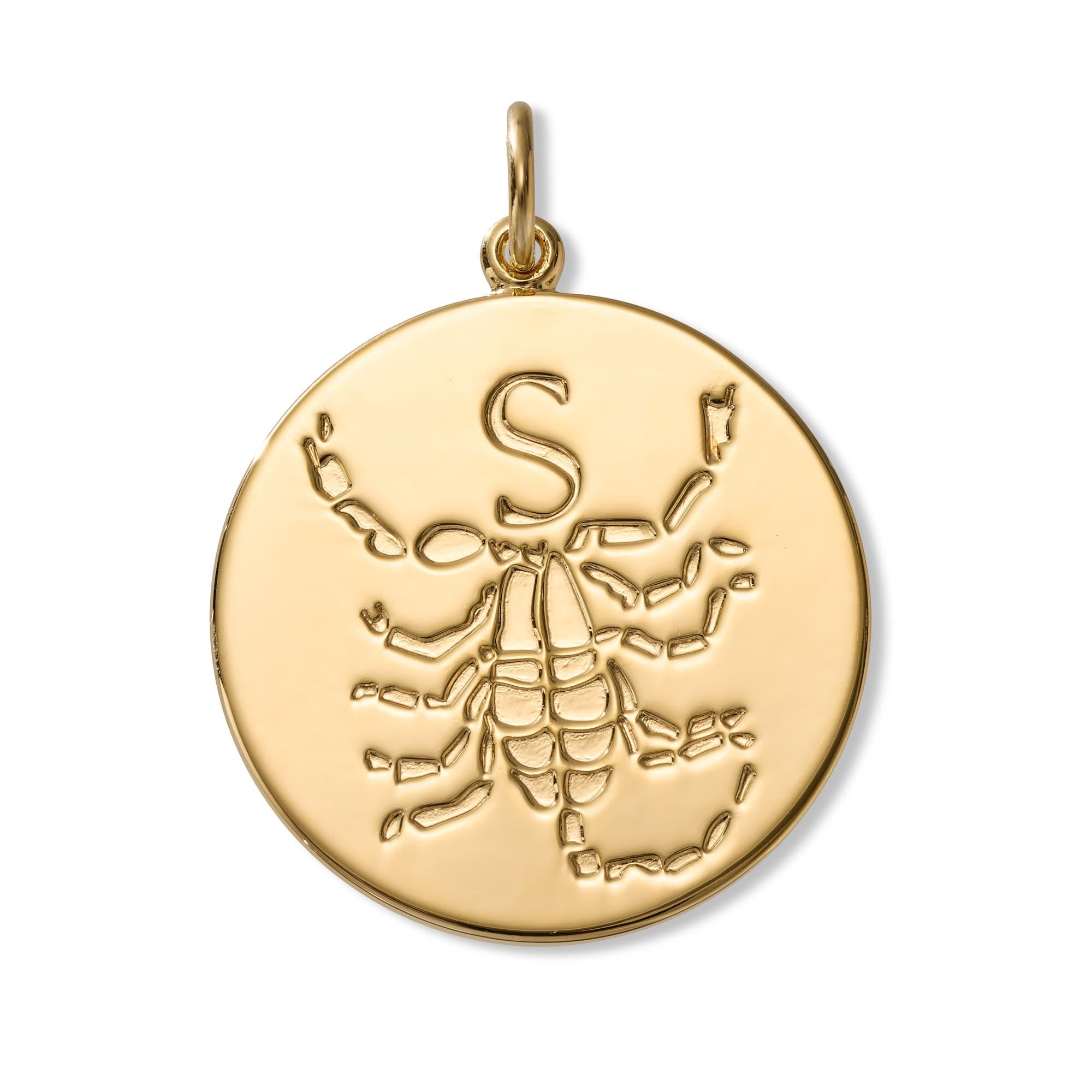 A round gold pendant featuring an engraved scorpion design with a capital letter 'S' at the top, shown on a clean white background.