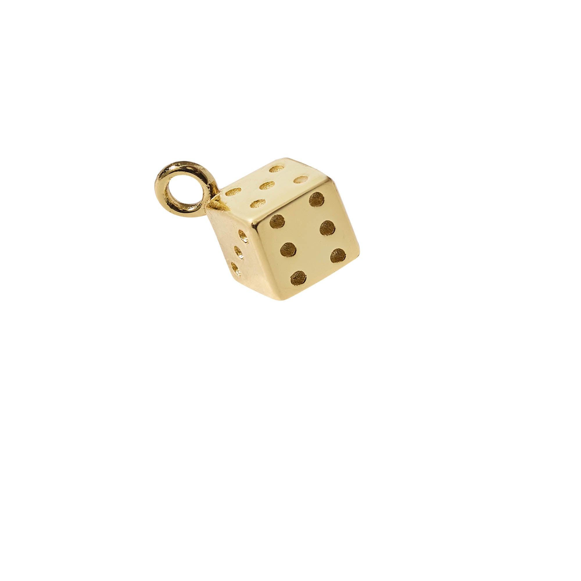 Gold dice charm on a white background