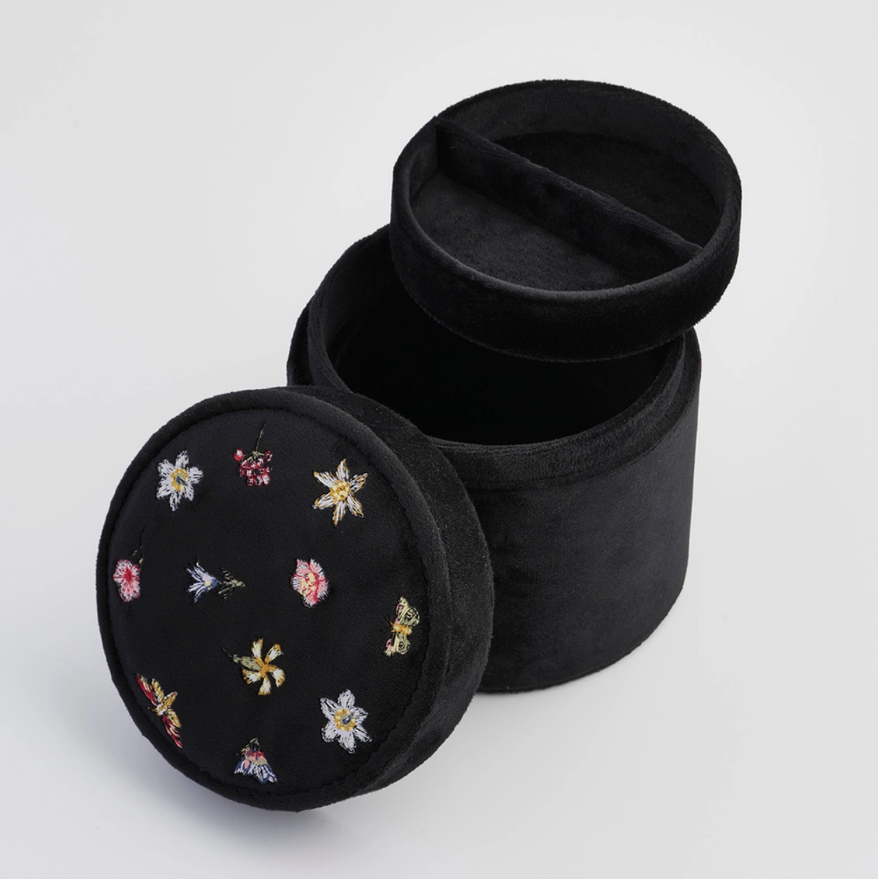 black embroidered jewelry box with different compartments 