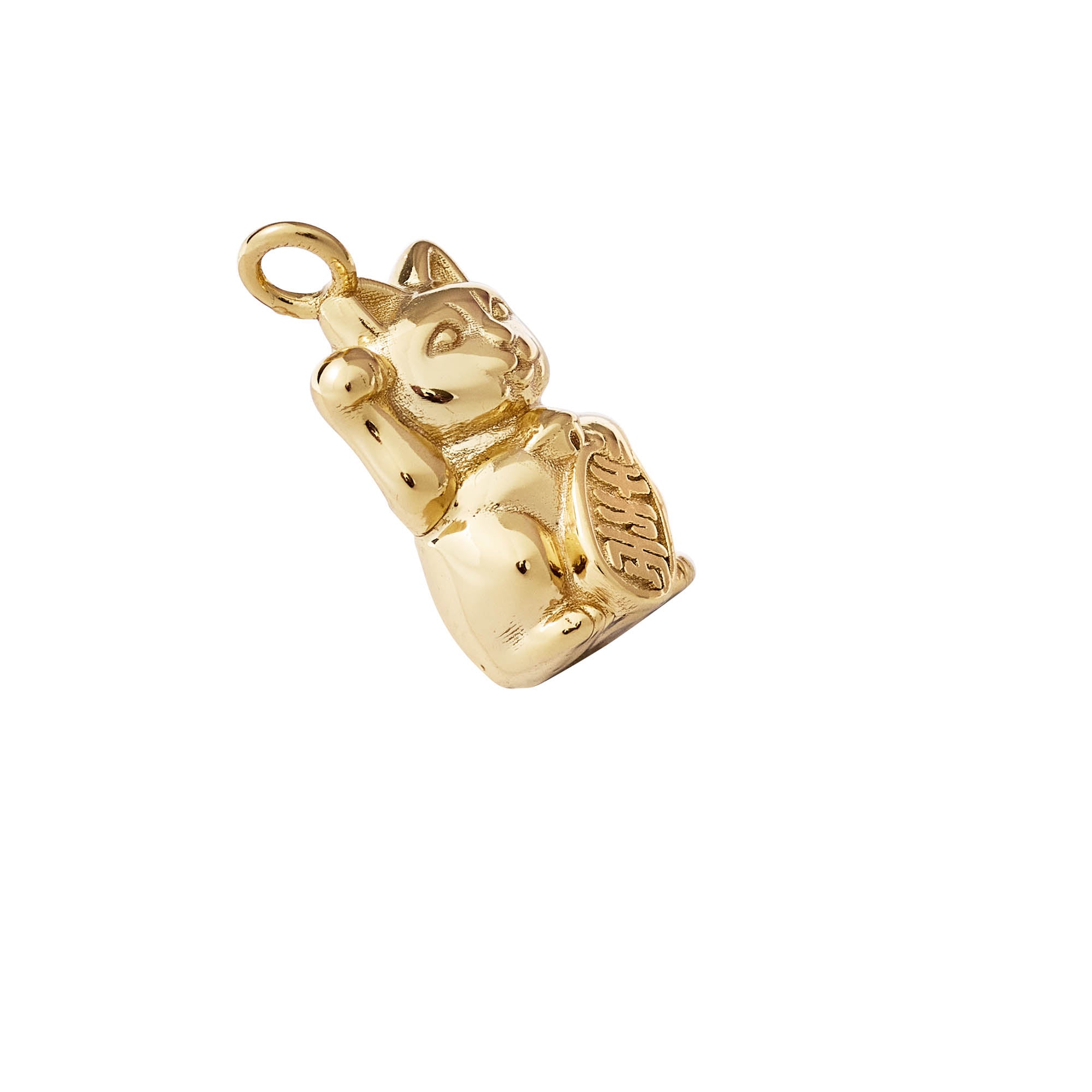 Gold lucky cat-shaped charm on a white background