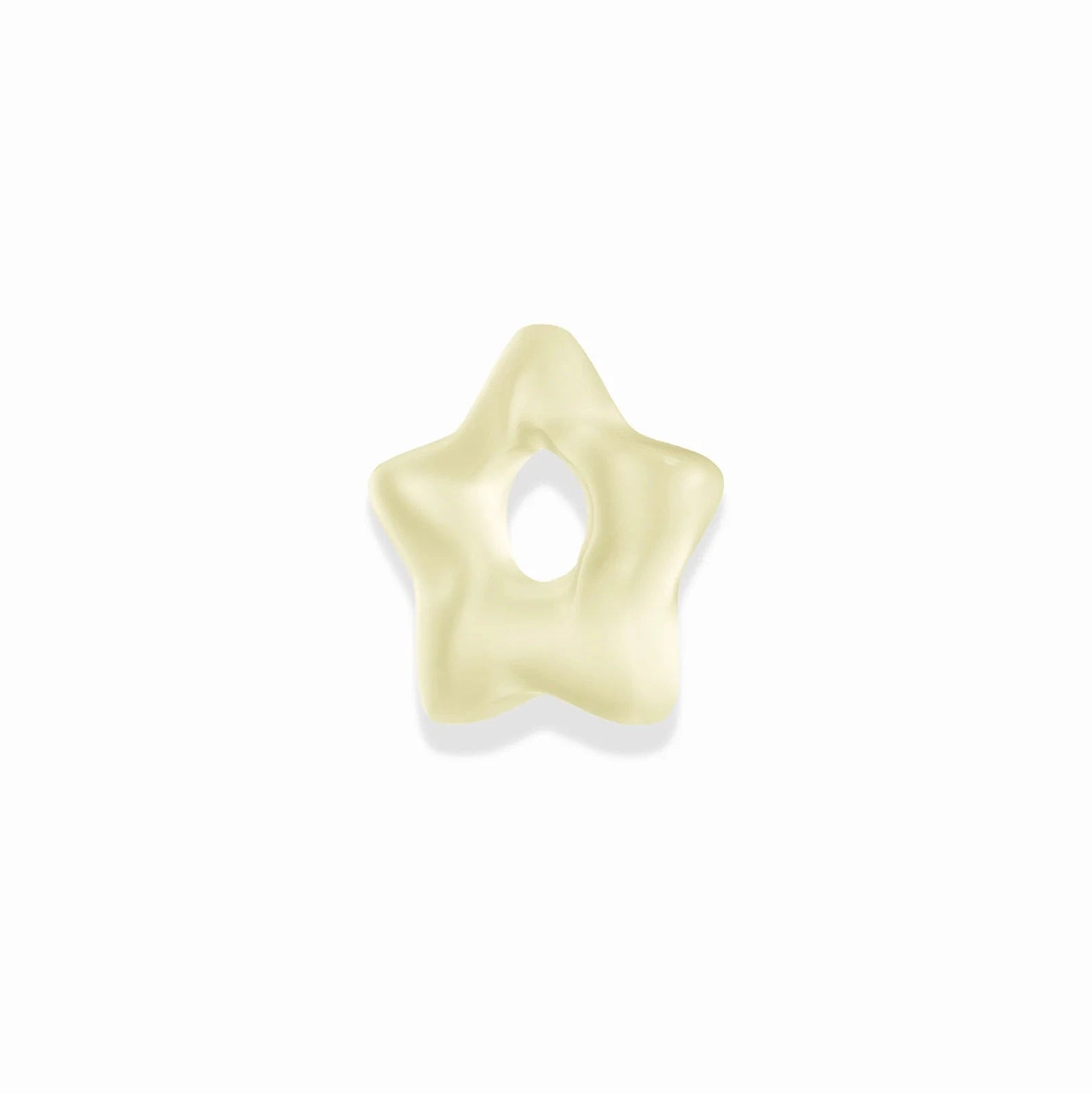 a light yellow star shaped gemstone spacer charm over a white background